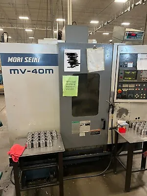 Buy Mori Seiki VERTICAL MACHINING CENTER, Model MV40M Control:  MSC 518/FANUC 18M • 13,850$